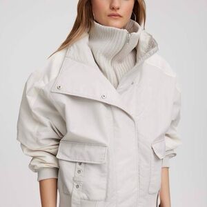 Cream Bomber Jacket with Adjustable Straps
Brand New! Never been worn.